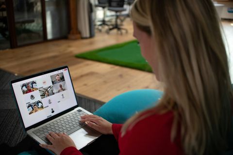 A client meeting her new assistant on a video call